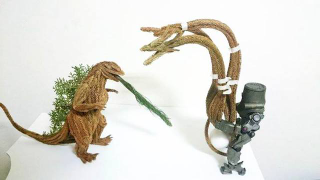Illustration for article titled Godzilla Made from Pine Tree Branches Is a Lovely Fire Hazard
